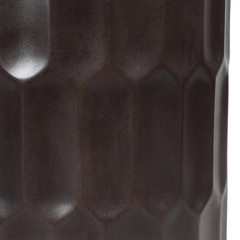 Close-up of a textured dark brown surface