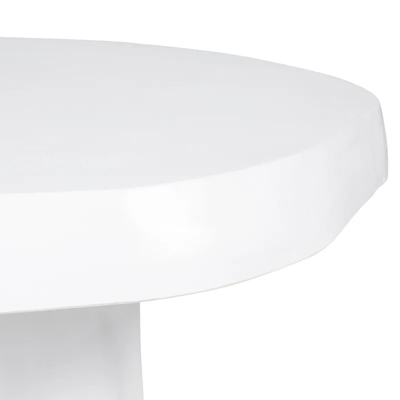 Close-up of a white round table with a smooth surface on a white background