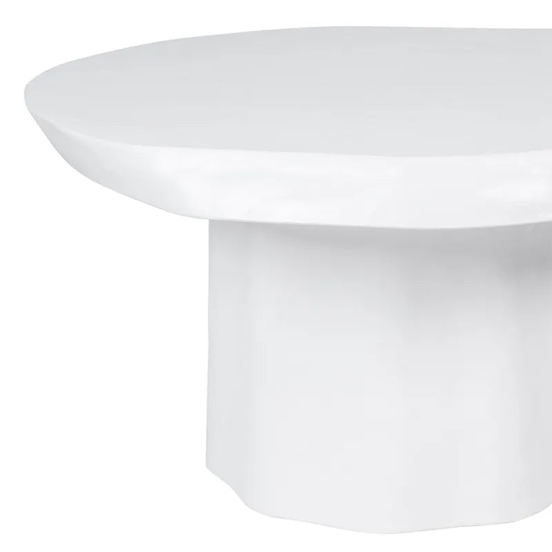 Round white coffee table on a white background