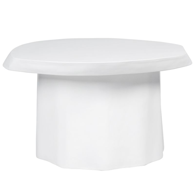 White cylindrical concrete coffee table with organic edge on a white background