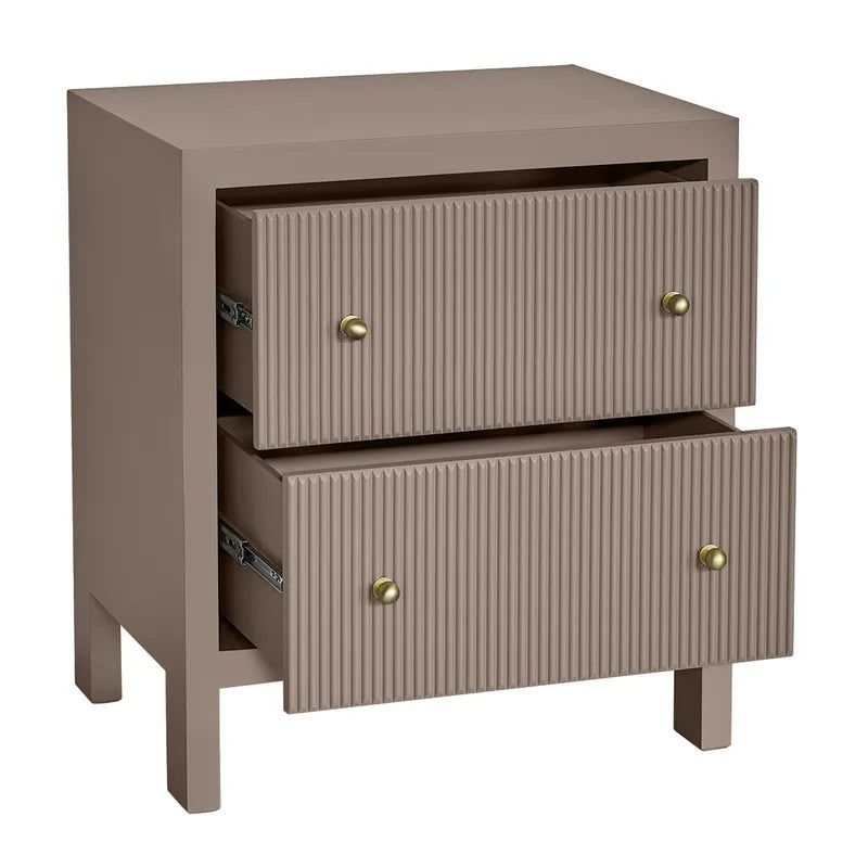 Beige nightstand with two drawers and brass knobs on a white background