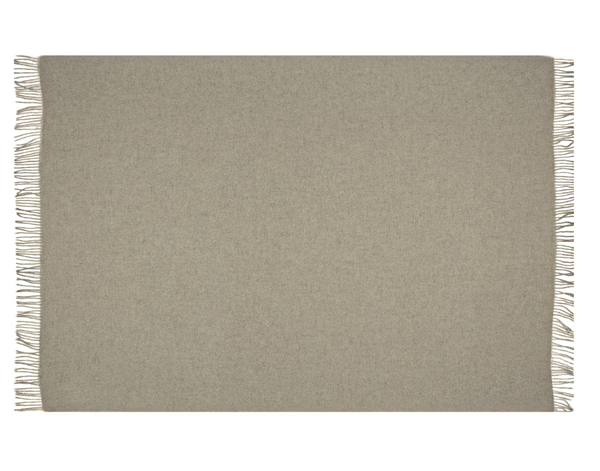 Beige blanket with fringes on a white background