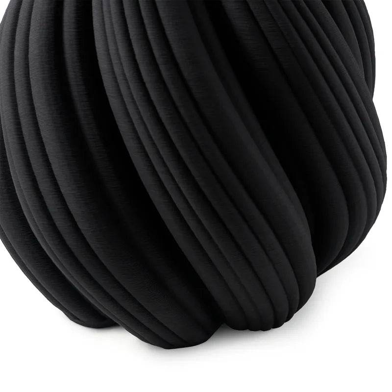 Black modern twist vase decor with a unique textured design for stylish home accents by Mirra Interiors