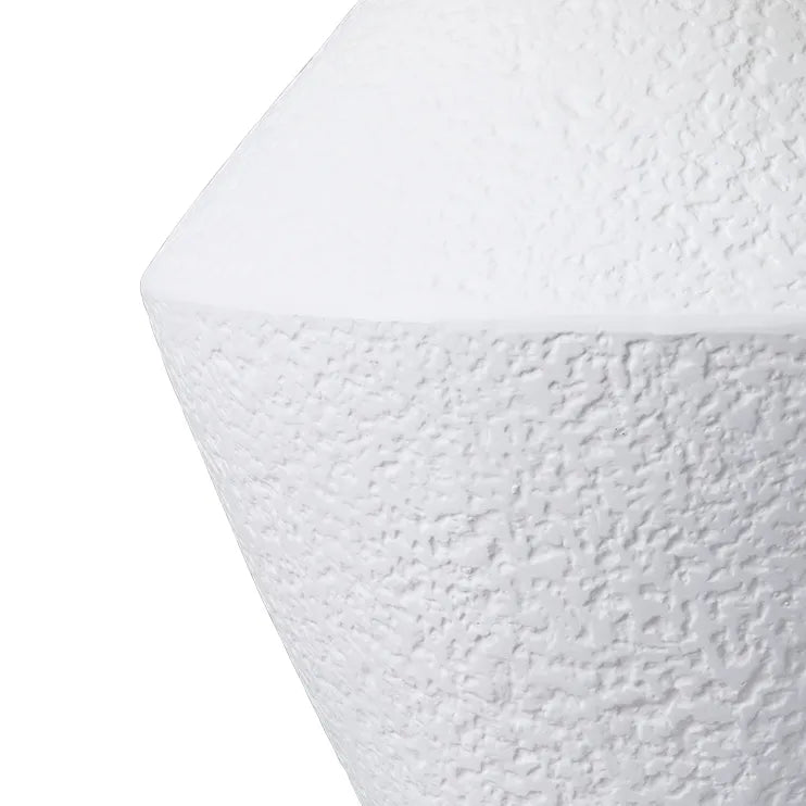 Close-up of a textured white table lamp base