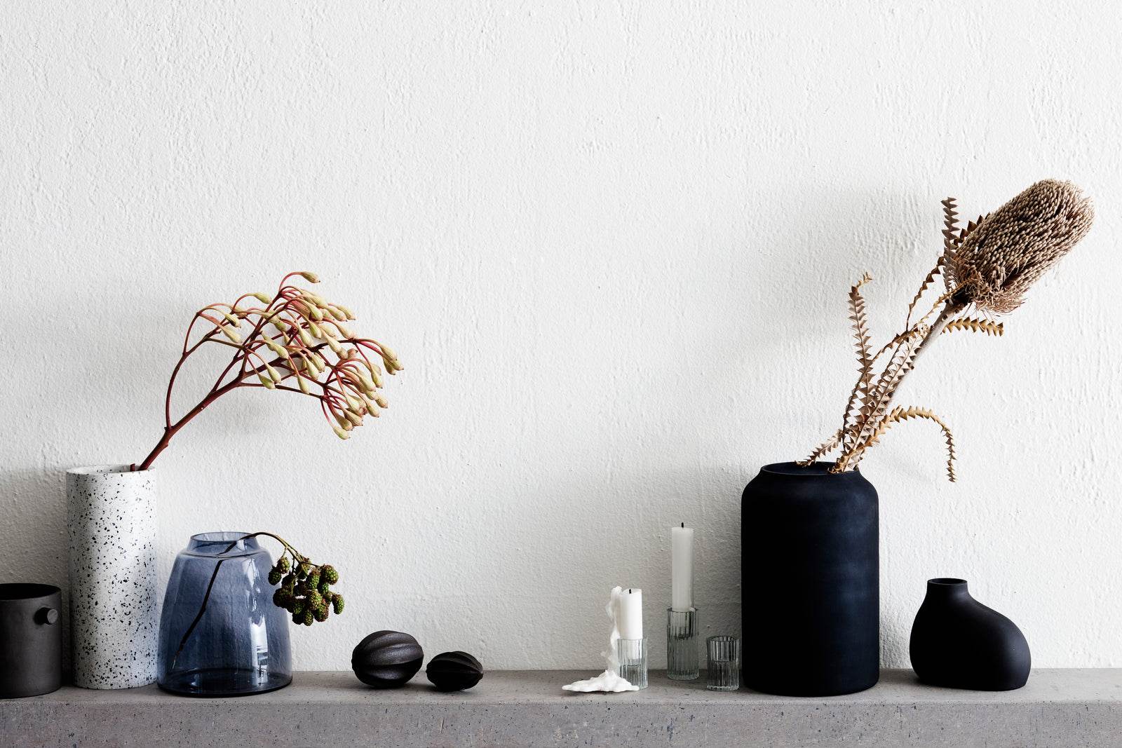 Zakkia Deco Glass Vase Frosted Black Styled on a shelf | Mirra Interiors