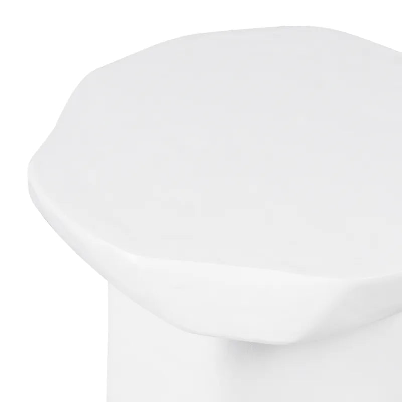 White concrete side table close up on a white background