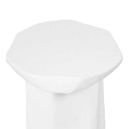 White concrete coffee table with an organic edge on a white background
