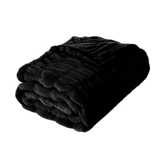 Folded black reversible blanket throw on a light white background | Mirra Interiors