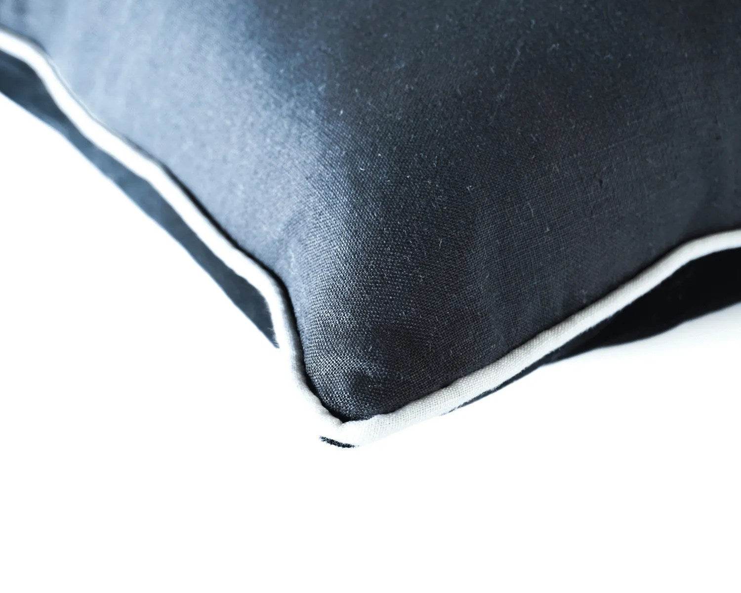 Calai | Contrast-Piped Linen Cushion Black - Mirra Interiors