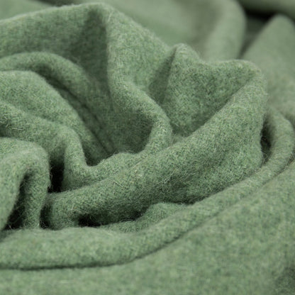 Close-up of green throw with folds