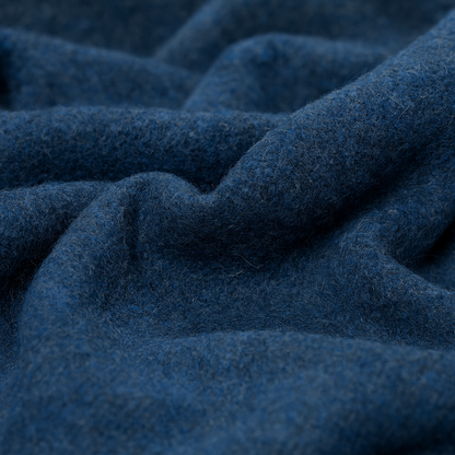 Close-up of blue fabric with a textured pattern
