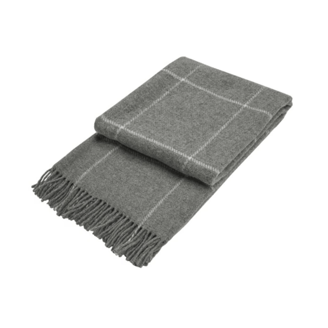 check grey wool throw folded on white background