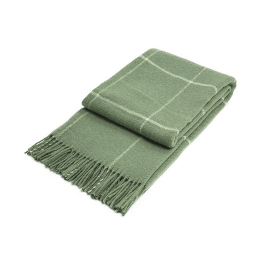 checkered sage green throw folded on white background