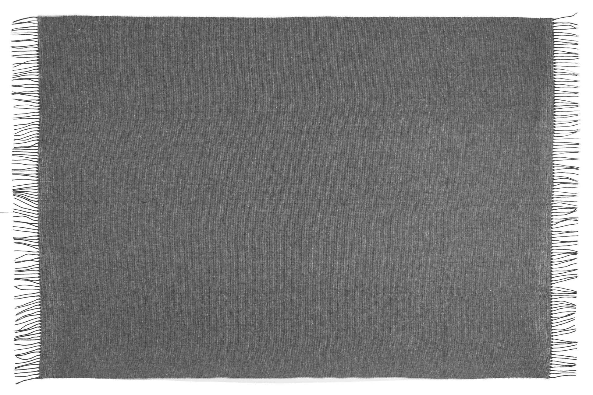 Grey throw blanket with fringed edges on a white background