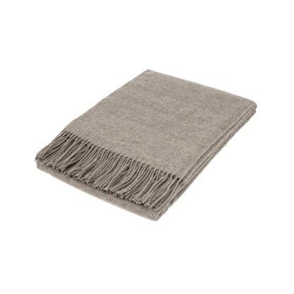natural mink brown wool blend throw with fringes folded on white background | Mirra Interiors