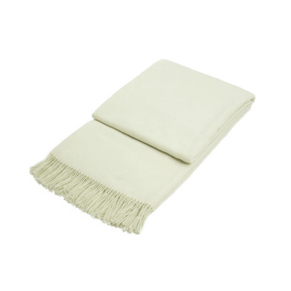 white ivory folded wool throw on white background