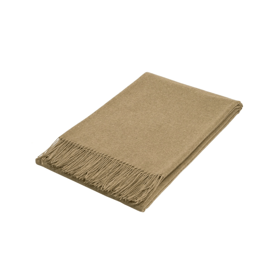 Camel folded wool textured throw rug on white background