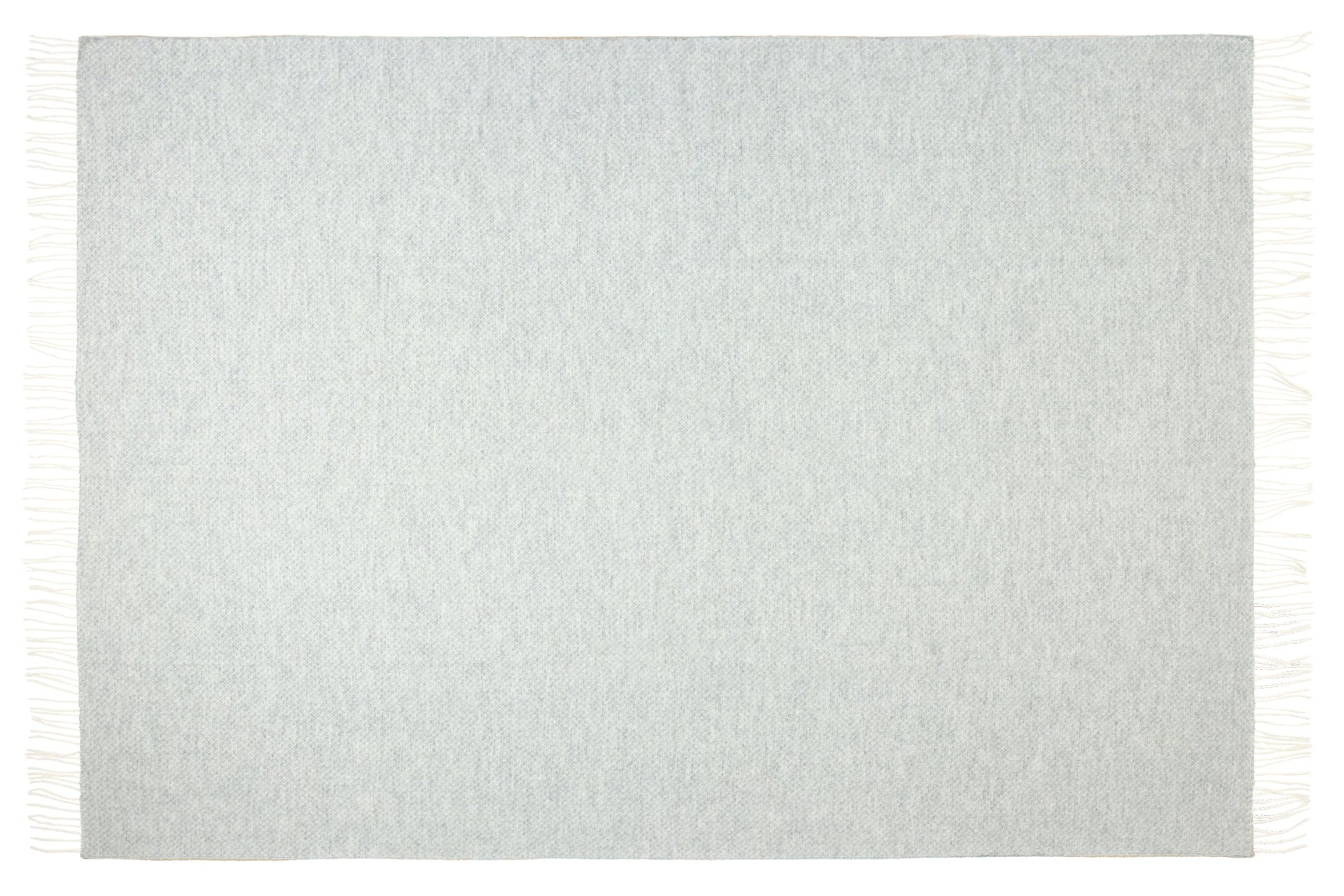 Light gray textured rug with white fringe on a plain background