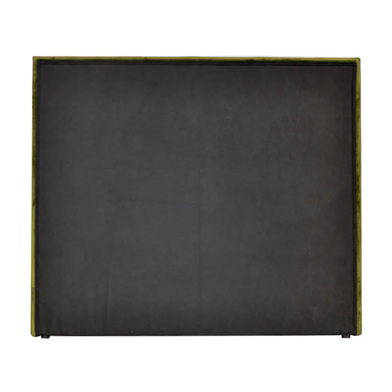 Back of velvet headboard on a white background
