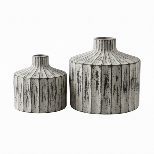 Two gray textured vases on a white background