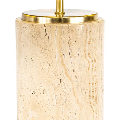 Beige travertine table lamp with gold base on a white background