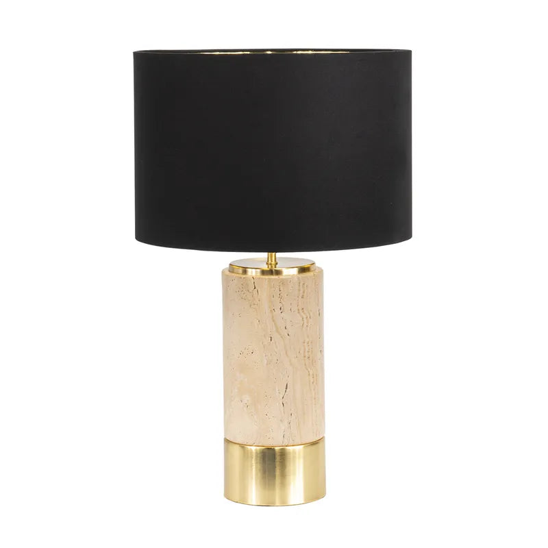 Travertine Table lamp with black shade and beige and gold base on a white background