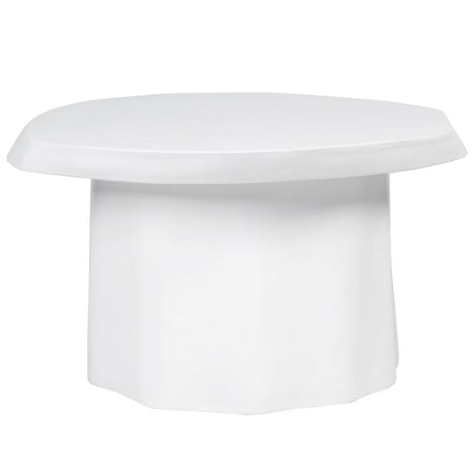 White cylindrical concrete coffee table with organic edge on a white background