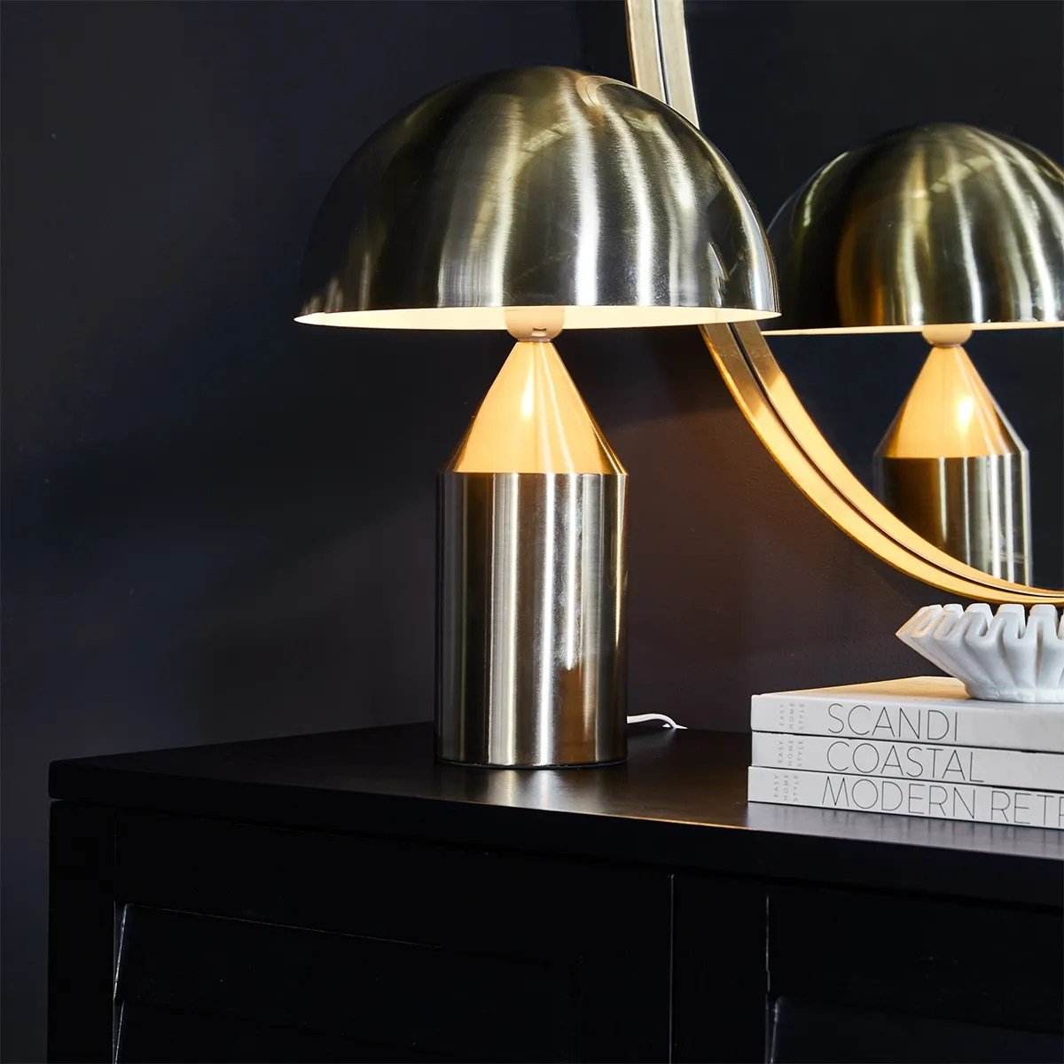 Brass Dome Table Lamp Styled on Black Sideboard in a Moody interior image | Mirra Interiors