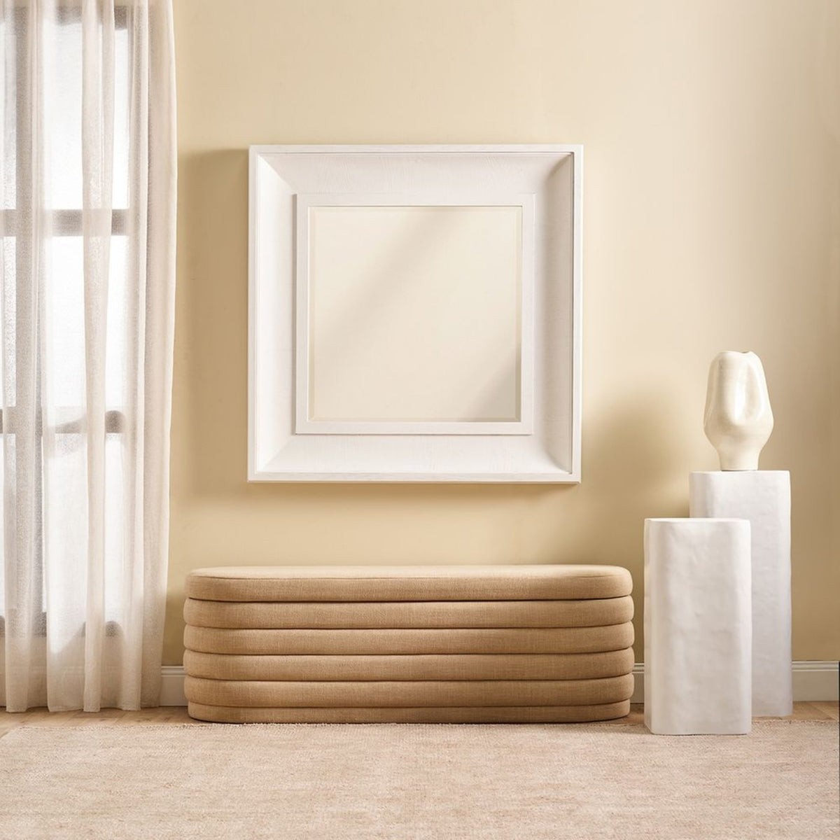 Bateman white wall mirror styled above a bench