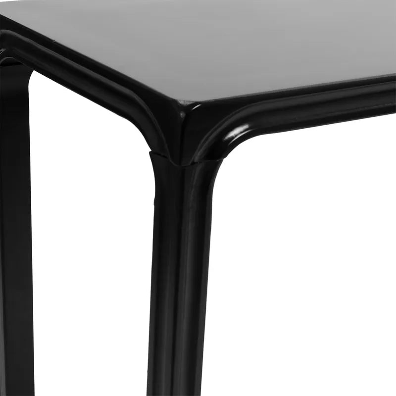 Close-up of a black timber console hall table leg with a black top