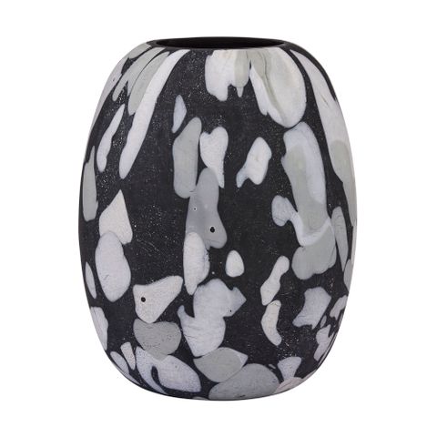 Decorative vase with black and white abstract pattern on a white background