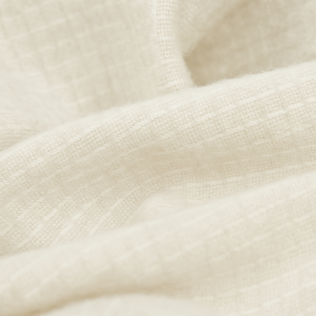 Close-up of textured beige fabric