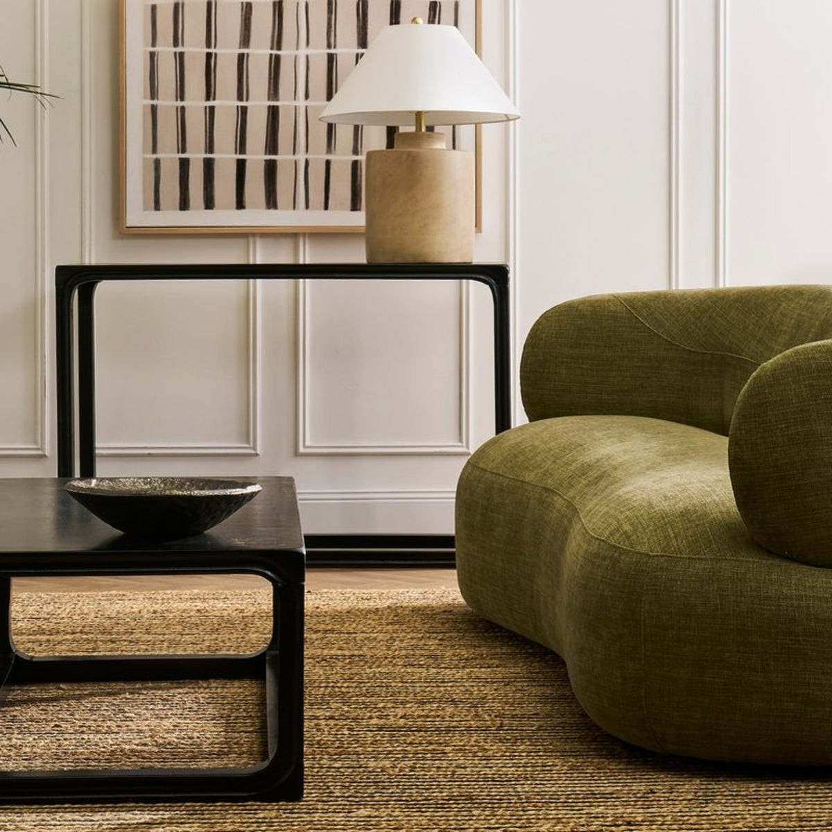 Talia table lamp on a console in a living room