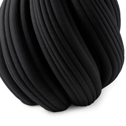 Black modern twist vase decor with a unique textured design for stylish home accents by Mirra Interiors