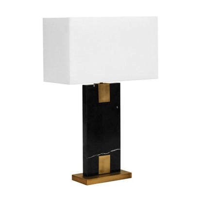 Angled view of Nera black marble table lamp and antique brass base