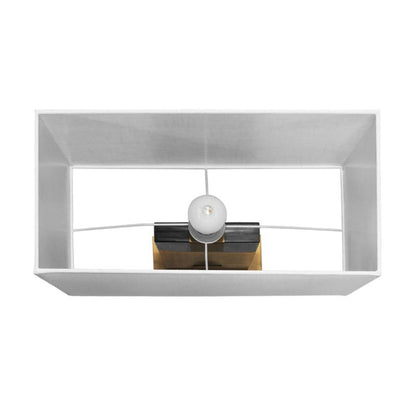 Underside view of white rectangular shade on Nera table lamp