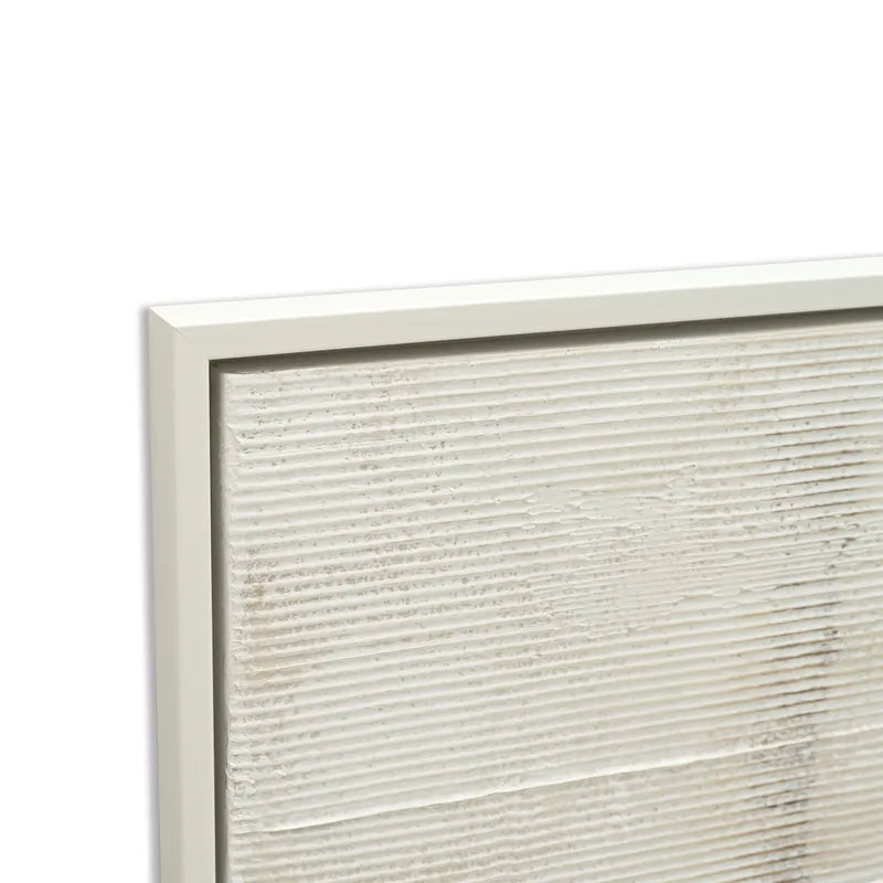 Close-up of a canvas painting with a white frame on a white background