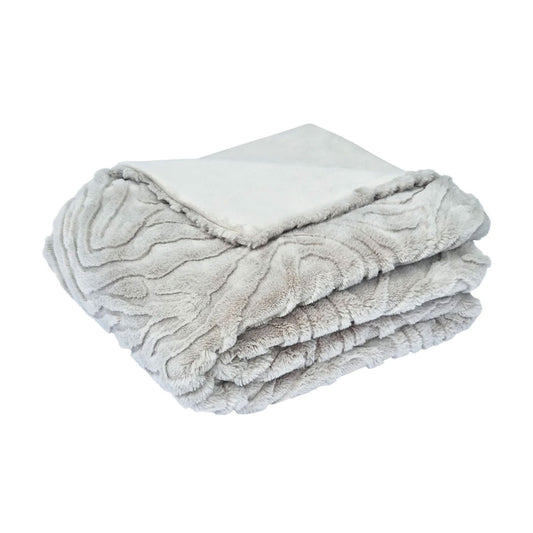 Folded silver grey textured blanket on a white background | Mirra Interiors
