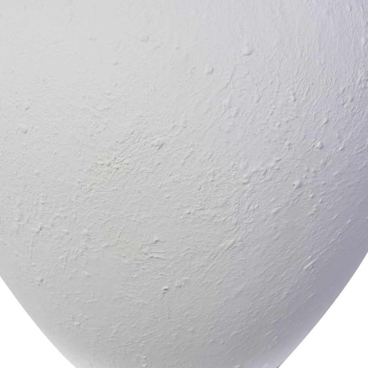 Close-up of Sora table lamp textured white base