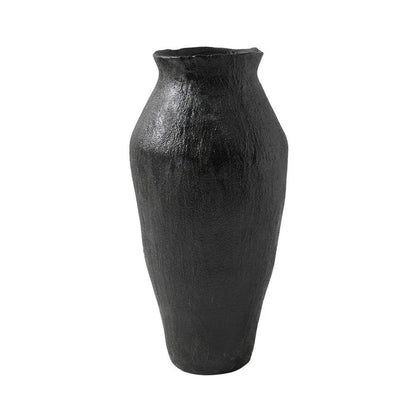 Textured black porcelain vase by Mirra Interiors, perfect for elegant home decor displays