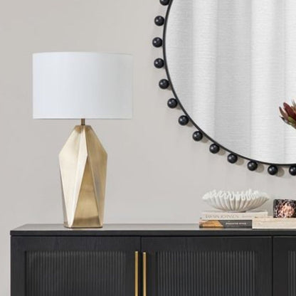 Vesper brass table lamps styled on a console