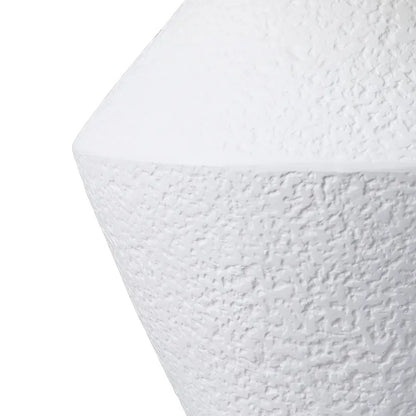 Close-up of a textured white table lamp base