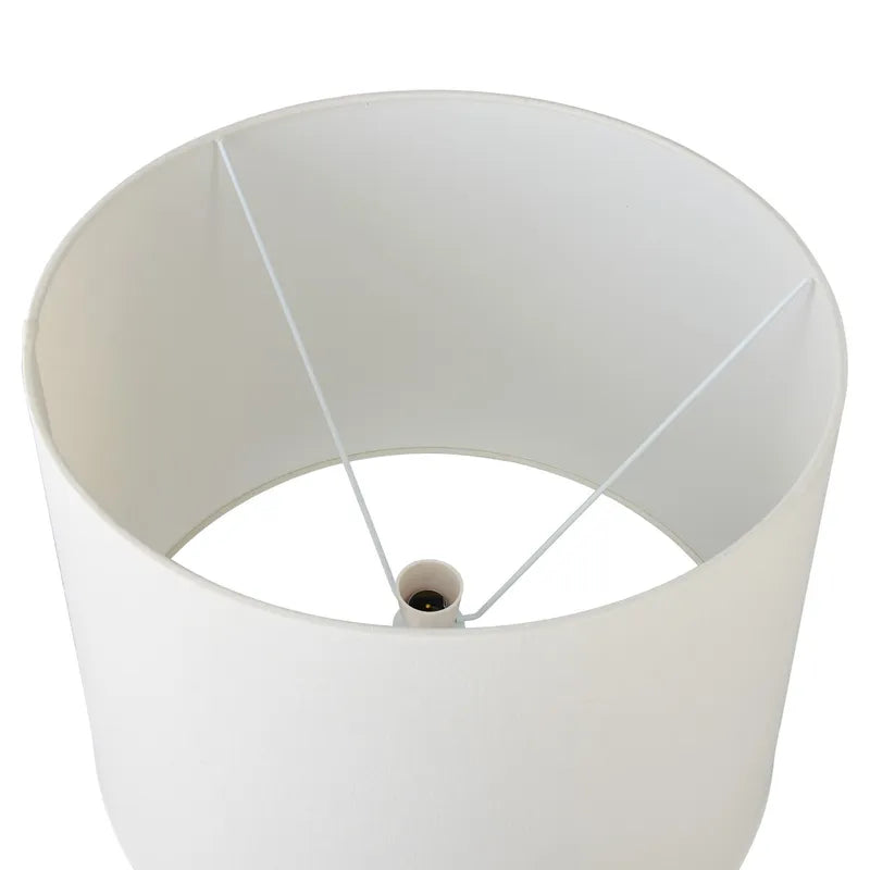 White lampshade with a cylindrical base on a white background